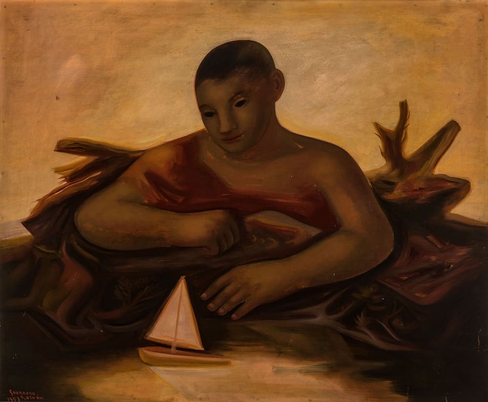 Niño con barco